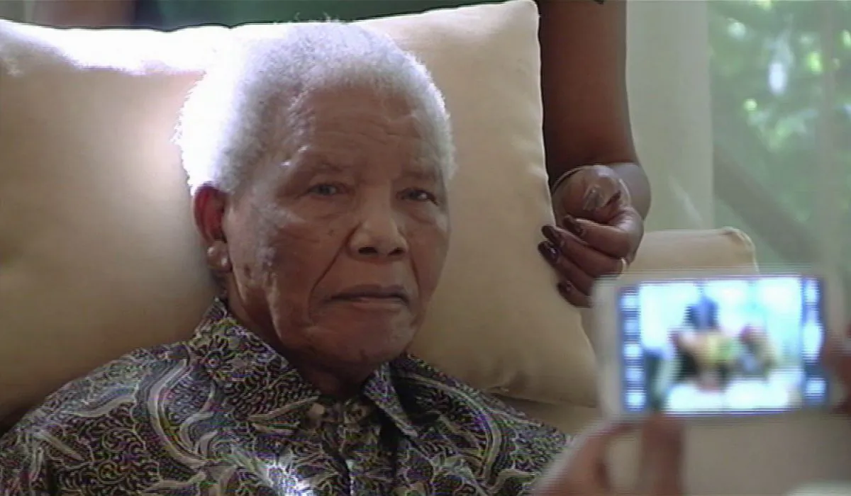 In this file image taken from video, the ailing anti-apartheid icon Nelson Madela is filmed Monday April 29, 2013, more than three weeks after being released from hospital. The 94-year-old anti-apartheid leader has been hospitalized for about three weeks with a reoccurring lung infection and South African officials have now deemed his condition critical. (SABC TV/AP)