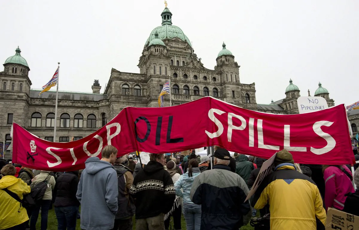 Protesters take part in a mass sit-in in front of the British Columbia legislature in Victoria, B.C. Monday, Oct. 22, 2012, to protest the proposed Northern Gateway pipeline. Brian Lee Crowley argues that Aboriginal opposition to the pipeline will wane if the federal government and businesses ensure they benefit appropriately from resource development. (THE CANADIAN PRESS/Jonathan Hayward)
