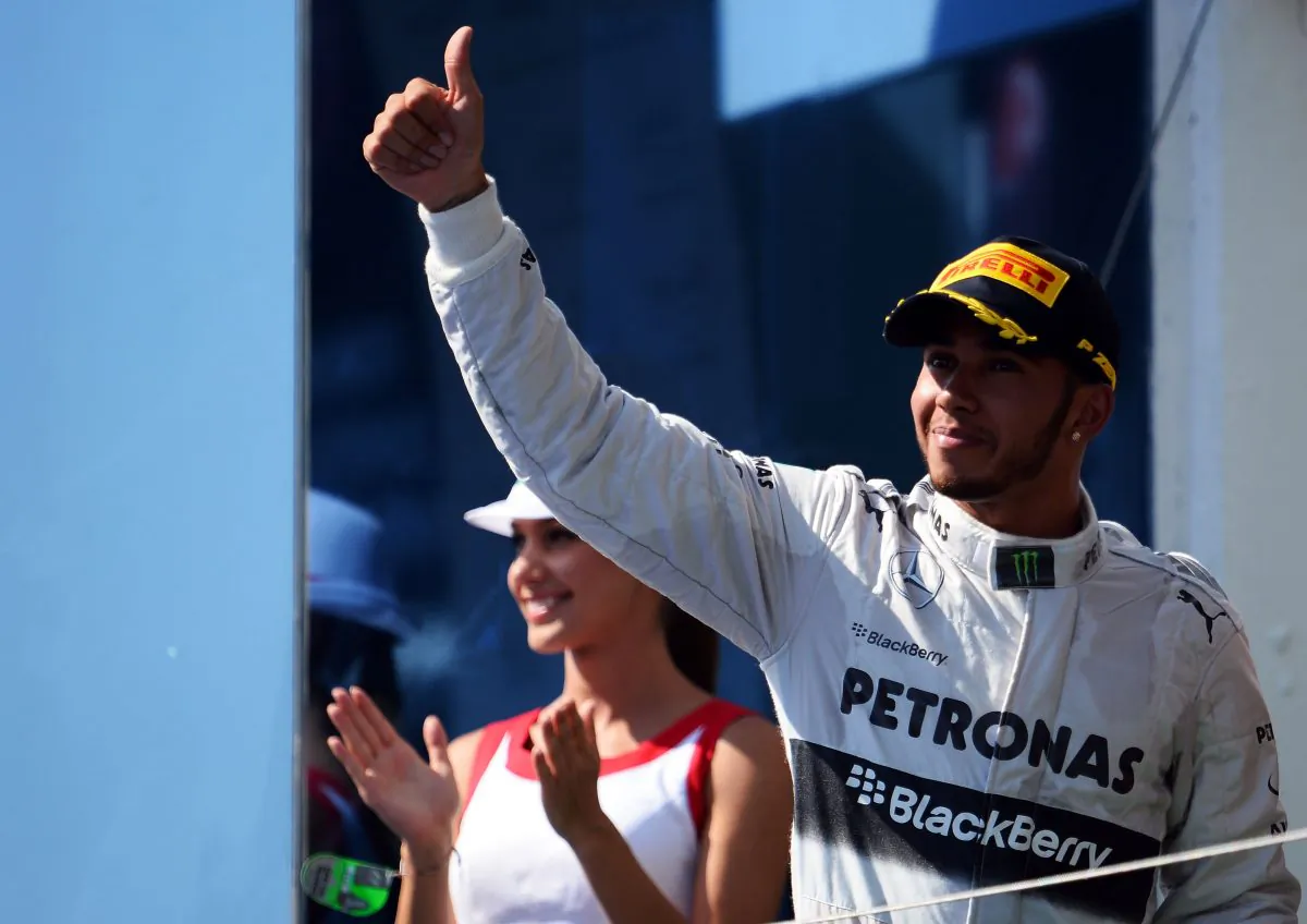 Lewis Hamilton of Mercedes GP celebrates on the podium after winning the Formula One Hungarian Grand Prix at Hungaroring on July 28, 2013 in Budapest, Hungary. (Lars Baron/Getty Images)