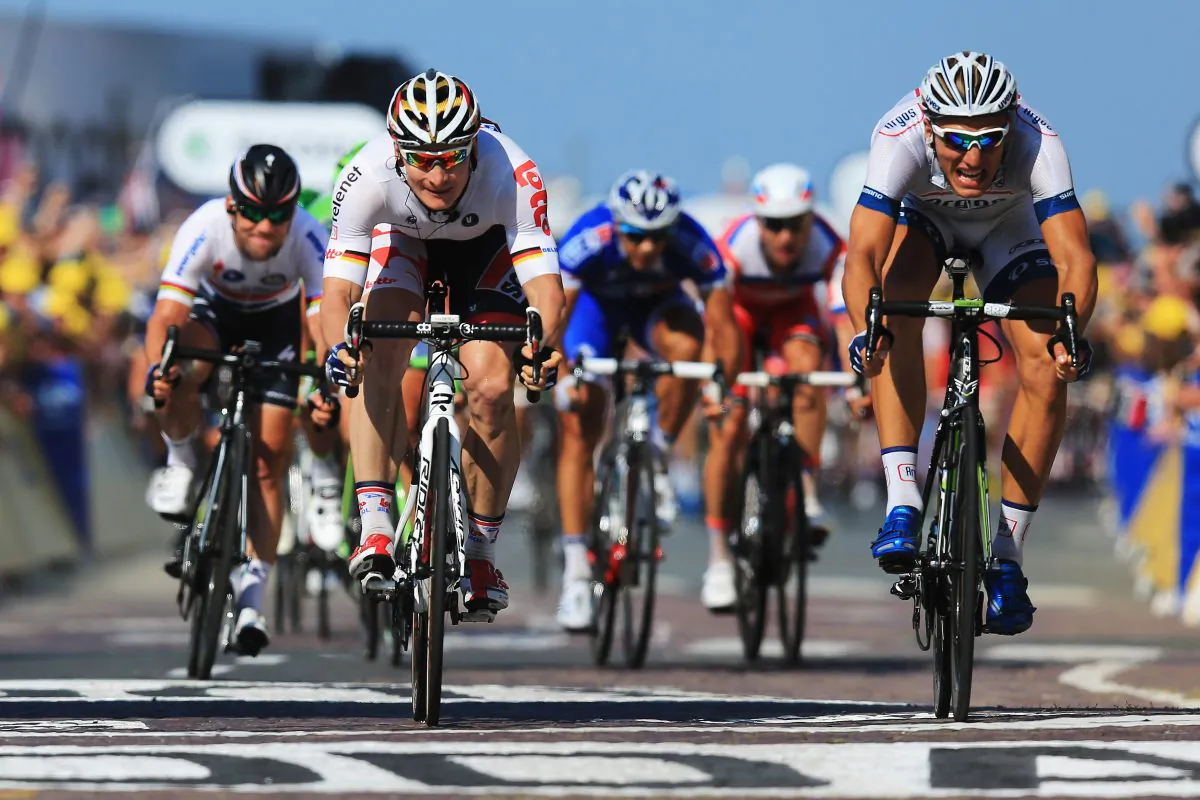 Marcel Kittel (R) of Argos-Shimano beats André Greipel (C) of Lotto Belisol and Mark Cavendish (L) Omega Pharma-Quick Step to the line during Stage Ten of the 2013 Tour de France, a 197-km road stage from St-Gildas-des-Bois to Saint Malo, on July 9, 2013 in St Malo, France. (Doug Pensinger/Getty Images)