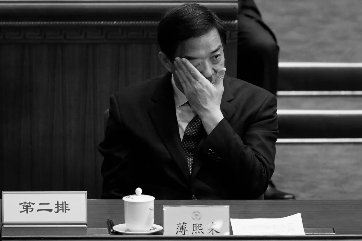 China's Chongqing Municipality Communist Party Secretary Bo Xilai attends closing session of the National Committee of the Chinese People's Political Consultative Conference (CPPCC) at the Great Hall of the People on March 13, 2012 in Beijing, China. Soon after that meeting, Bo's political destruction began, and he now awaits trial on charges of corruption. (Lintao Zhang/Getty Images)