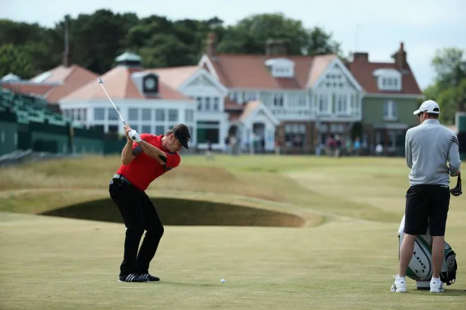 Sir Nick Faldo of England hits a shot on the 18th hole ahead of the 142nd Open Championship at Muirfield on July 15, 2013, in Gullane, Scotland. (Andy Lyons/Getty Images)