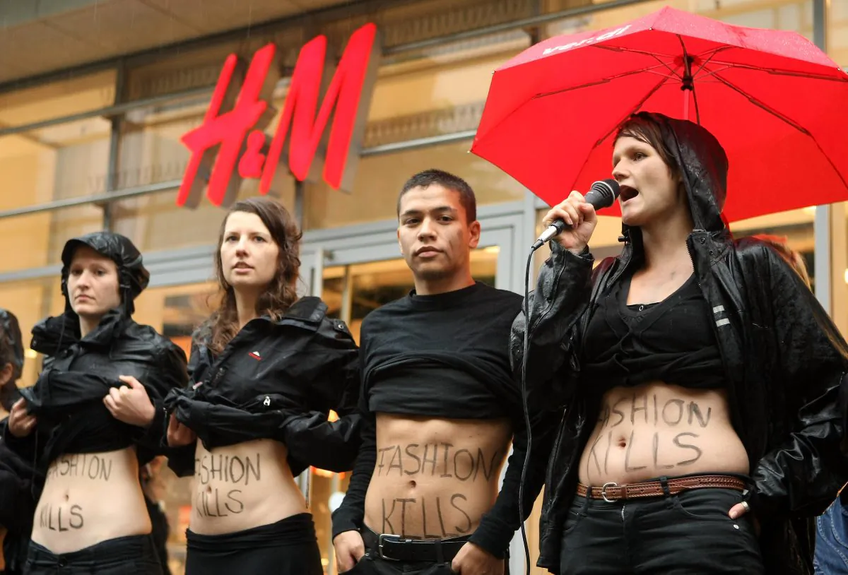 Young activists from the labor rights group ver.di demonstrate against working conditions at production sites used by the H&M clothing chain in Bangladesh on July 14, 2012 in Berlin, Germany. Bangladesh announced new workplace laws on July 15, 2013. (Adam Berry/Getty Images)