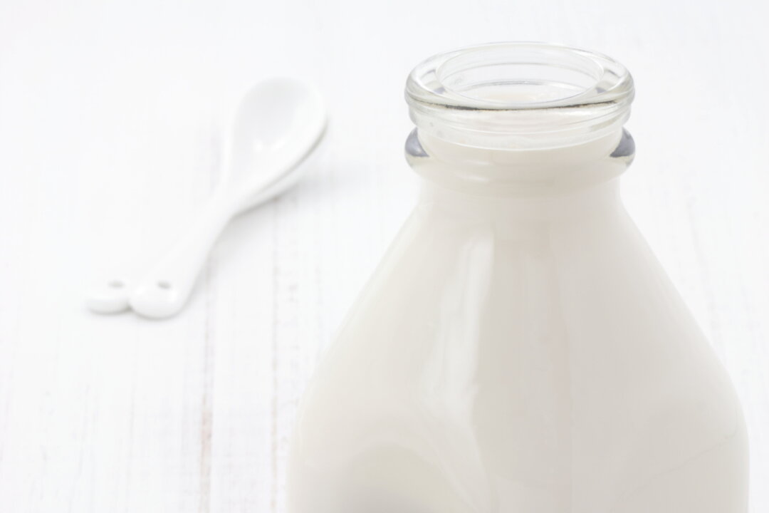 When buying commercial yogurts, beware of added sugars, which will only undo yogurt health benefits . (Raul Taborda/photos.com)
