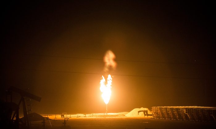 A gas flare is seen outside Williston, N.D., on July 23, 2013. (Andrew Burton/Getty Images)