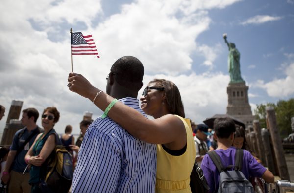 Visitors on Liberty Island on 4th of July, 2013. (Samira Bouaou/Epoch Times)