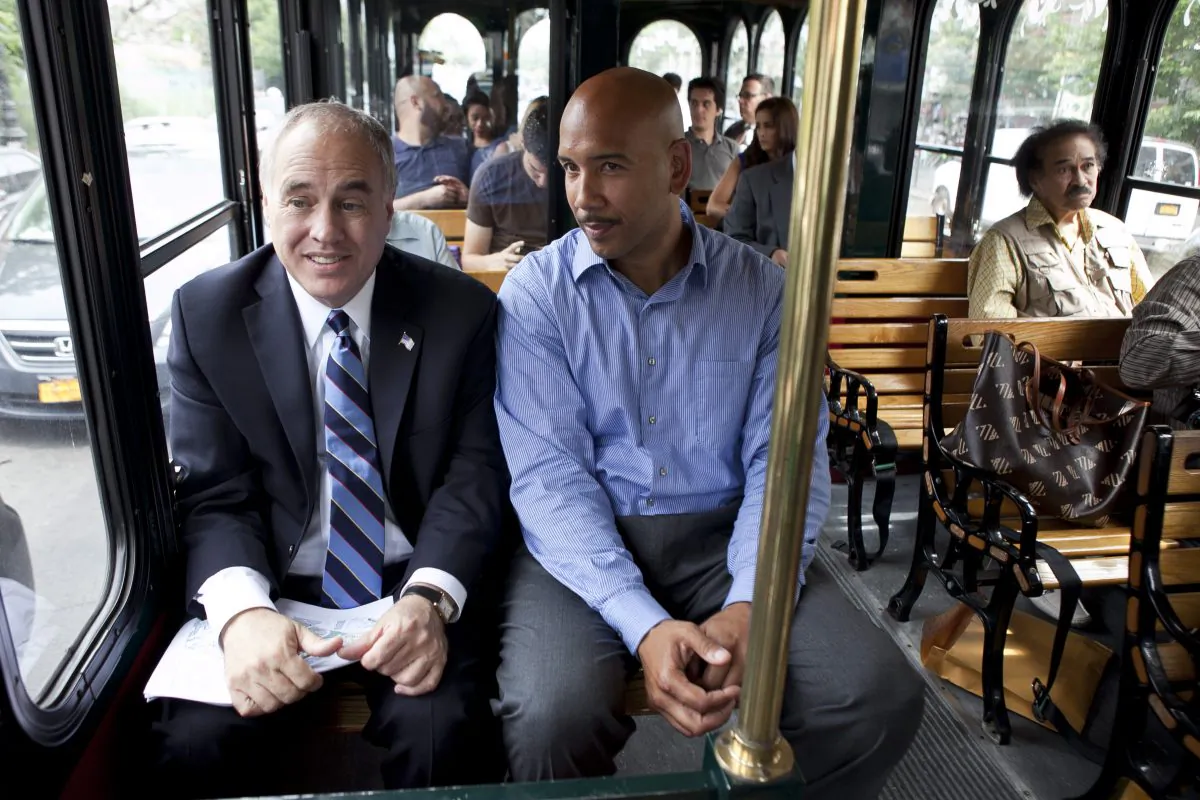 New York State Comptroller Thomas DiNapoli (L) and Bronx Borough President Ruben Diaz Jr. have a discussion during the Bronx tour on July 11. (Samira Bouaou/Epoch Times)