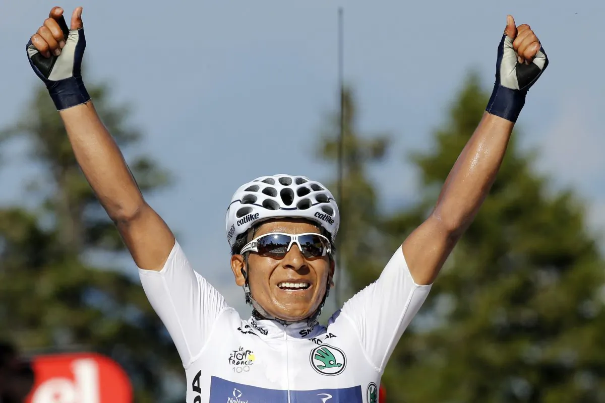Movistar's Nairo Quintana celebrates as he crosses the finish line at the end of the 125-km Stage 20 of the 100th edition of the Tour de France cycling race on July 20, 2013 between Annecy and Annecy-Semnoz, French Alps. (Pascal Guyot/AFP/Getty Images)
