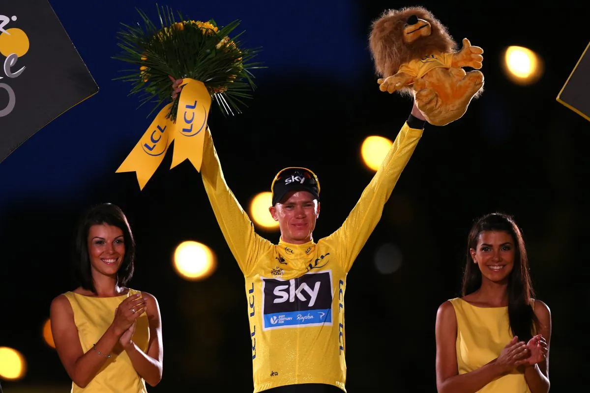 Winner of the 2013 Tour de France, Chris Froome of Sky Procycling celebrates on the podium on the Champs-Elysées in Paris, France, on July 21, 2013. (Bryn Lennon/Getty Images)