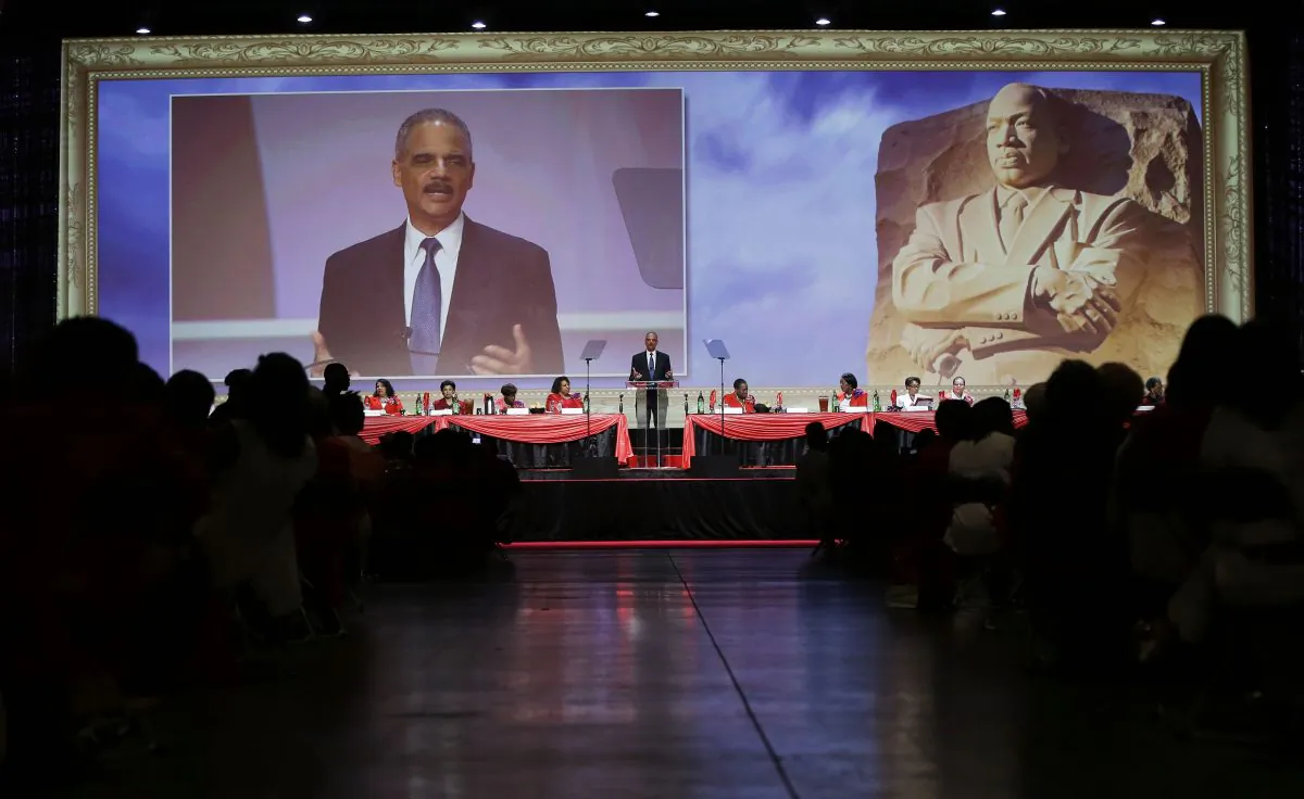 Attorney General Eric Holder speaks at the Delta Sigma Thetas Social Action luncheon, part of the sorority's 51st National Convention in Washington, Monday, July 15, 2013. (AP Photo/Pablo Martinez Monsivais)