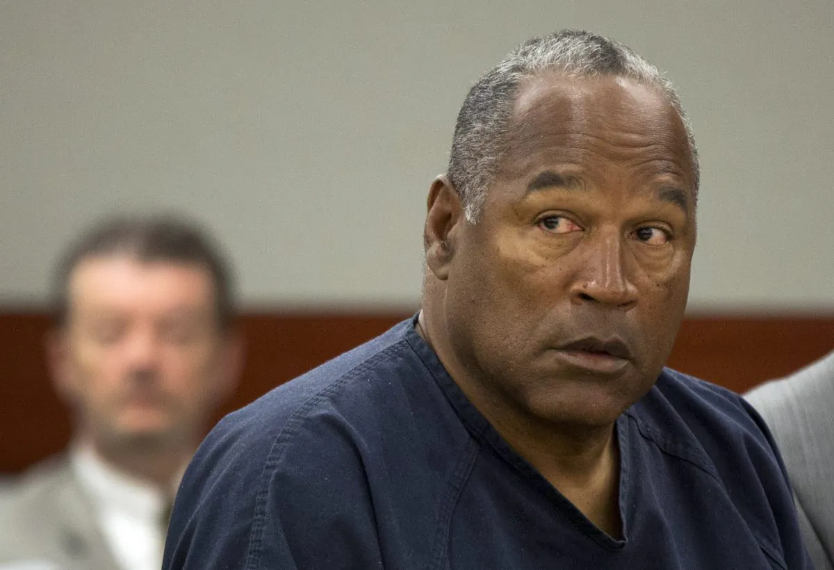 O.J. Simpson listens during an evidentiary hearing in Clark County District Court in Las Vegas on May 16, 2013. (Julie Jacobson/File Photo via AP)