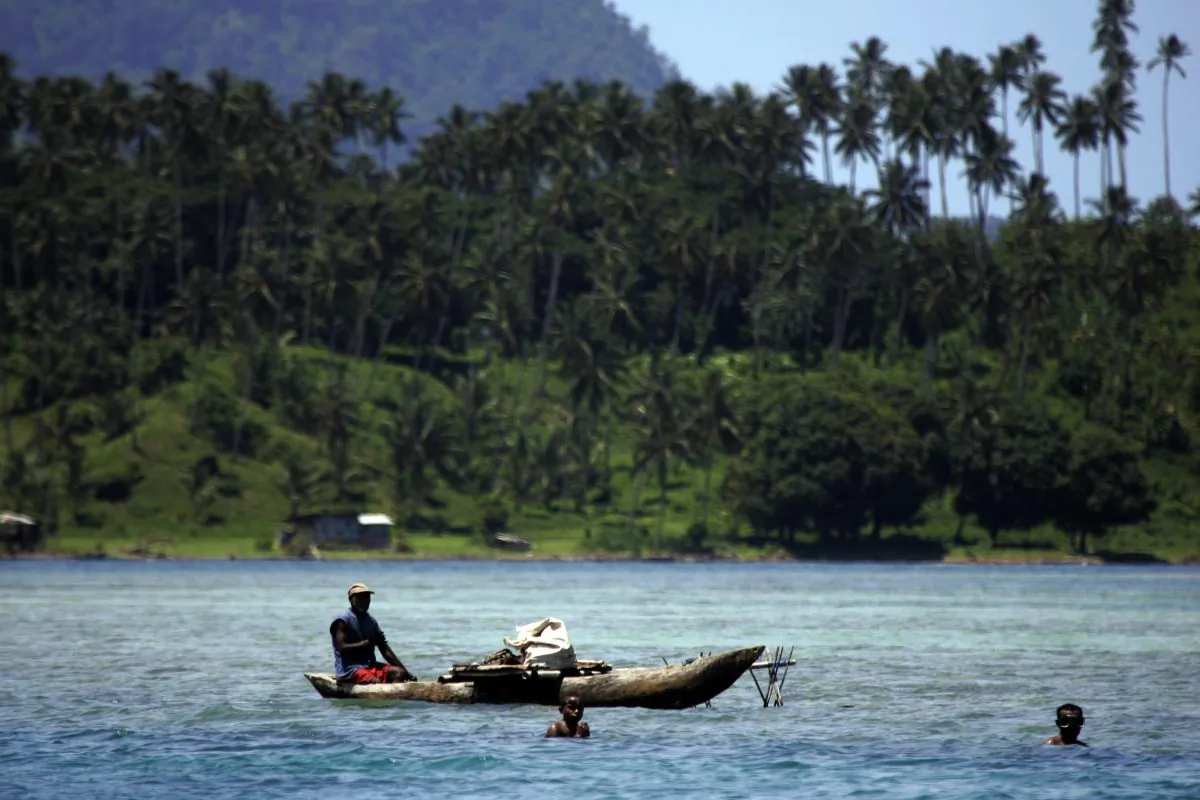 Residents fish on the island of New Britain, Papua New Guinea near Kimbe Bay on Nov. 28, 2007. Papua New Guinea is part of New Guinea, the second-largest island in the world. (David Longstreath/AP)