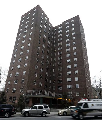 This Wednesday, March 6, 2013 photo shows the apartment building at 1475 Madison Avenue in New York. The New York Public Housing Authority (NYCHA) announced on July 1 that they have reduced the number of open work orders at their properties to under 220,000. (AP Photo/Frank Franklin II)