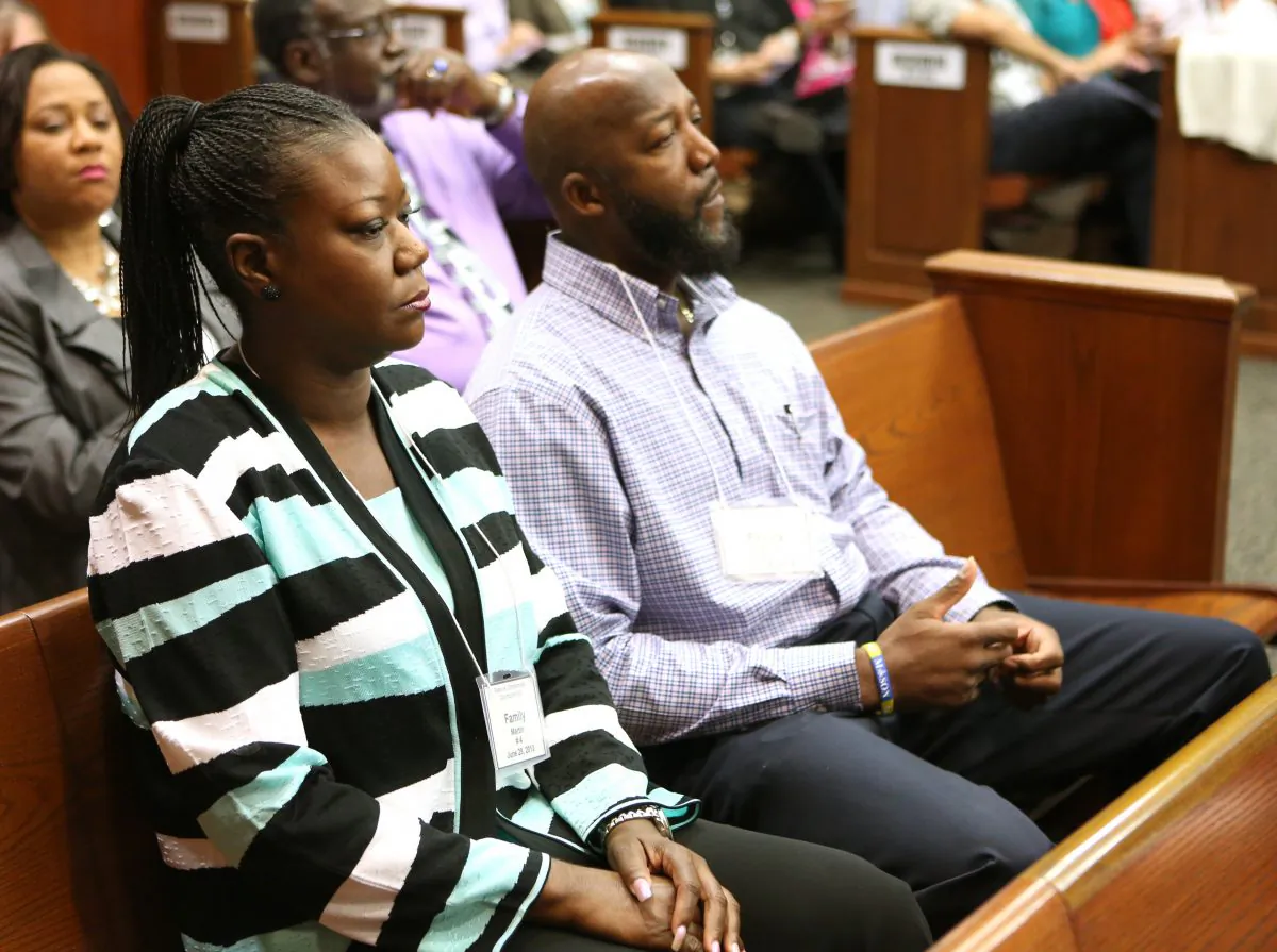 The parents of Trayvon Martin, Sybrina Fulton, left, and Tracy Martin, listen to testimony of a witness during the 15th day of George Zimmerman's trial in Seminole circuit court, in Sanford, Fla., Friday, June 28, 2013. They said on July 19 that President Barack Obama's words were inspirational. (AP Photo/Orlando Sentinel, Joe Burbank, Pool)