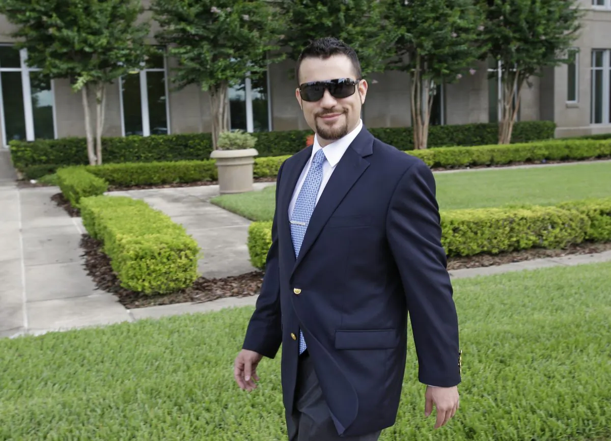 Robert Zimmerman Jr., arrives at the Seminole County Courthouse for a pre-hearing for his brother George Zimmerman, Friday, June 7, 2013, in Sanford, Fla. (AP Photo/John Raoux)
