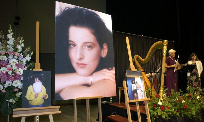 Photographs of Chandra Levy are displayed during a memorial for her at the Modesto Centre Plaza in Modesto, Calif., on May 28, 2002. (Debbie Noda/AFP/Getty Images)