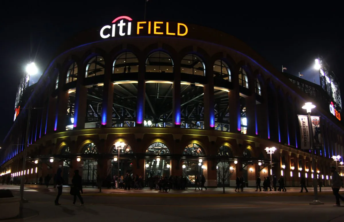 Fans come and go from Citi Field during a baseball game between the New York Mets and Miami Marlins on Friday, April 5, 2013, in New York. (Peter Morgan/AP Photo)