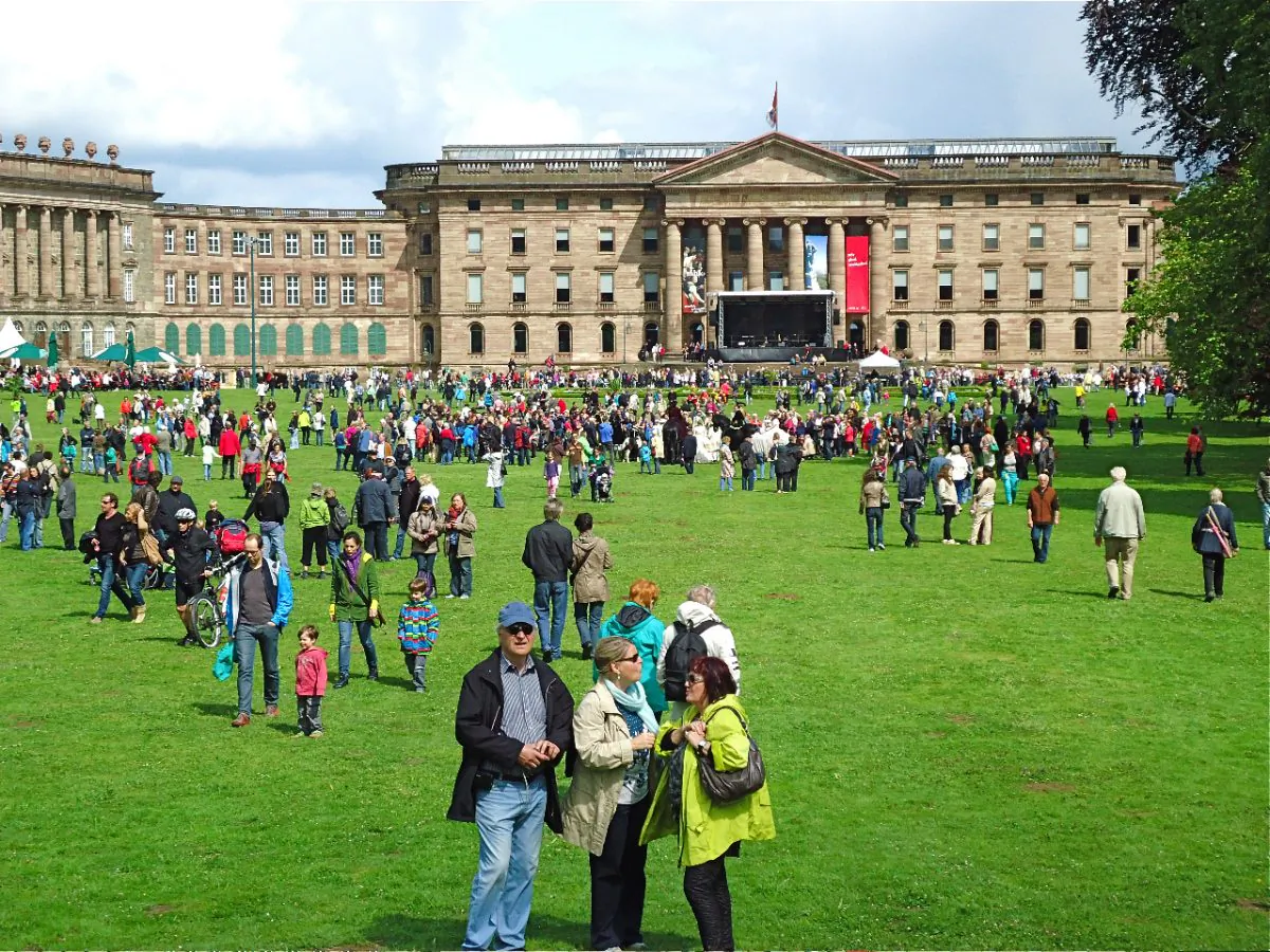 The crowd celebrates acceptance by the UNESCO World Heritage Centre before Wilhelmshohe Palace. (Susan James)