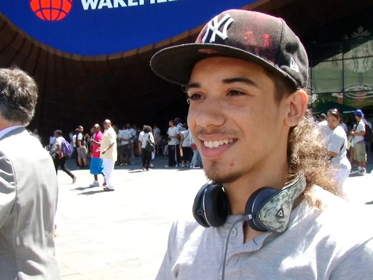 17-year-old Daquan Jackson worked for NYC's YouthWRAP program earlier this year, helping Hurricane Sandy victims and getting himself back on track. (Steven Wang/New Tang Dynasty Television)