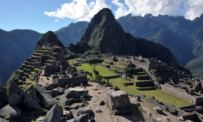 Tourists walk among the ruins of the Machu Picchu citadel, Peru, on July 6, 2011. (Cris Bouroncle/AFP/Getty Images) 