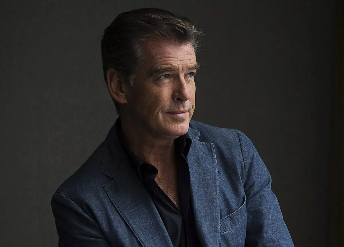 This Sept. 9, 2012 file photo shows actor Pierce Brosnan during a photo shoot to promote the movie "Love is All You Need" at the 2012 Toronto International Film Festival in Toronto. (AP Photo/The Canadian Press, Michelle Siu)