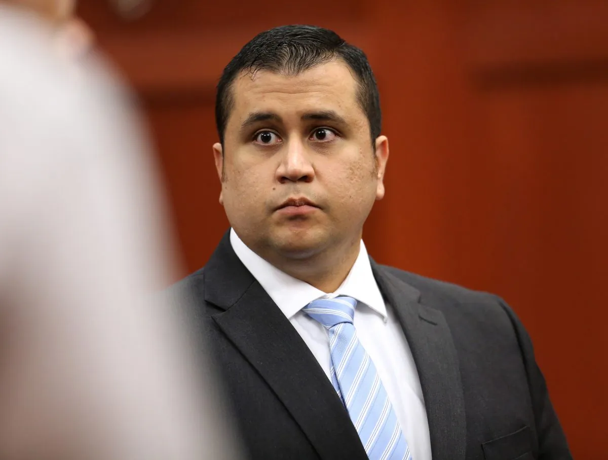 George Zimmerman leaves court at the end of the session of his trial in Seminole circuit court, in Sanford, Fla., Monday, July 1, 2013. Zimmerman has been charged with second-degree murder for the 2012 shooting death of Trayvon Martin.(AP Photo/Orlando Sentinel, Joe Burbank, Pool)