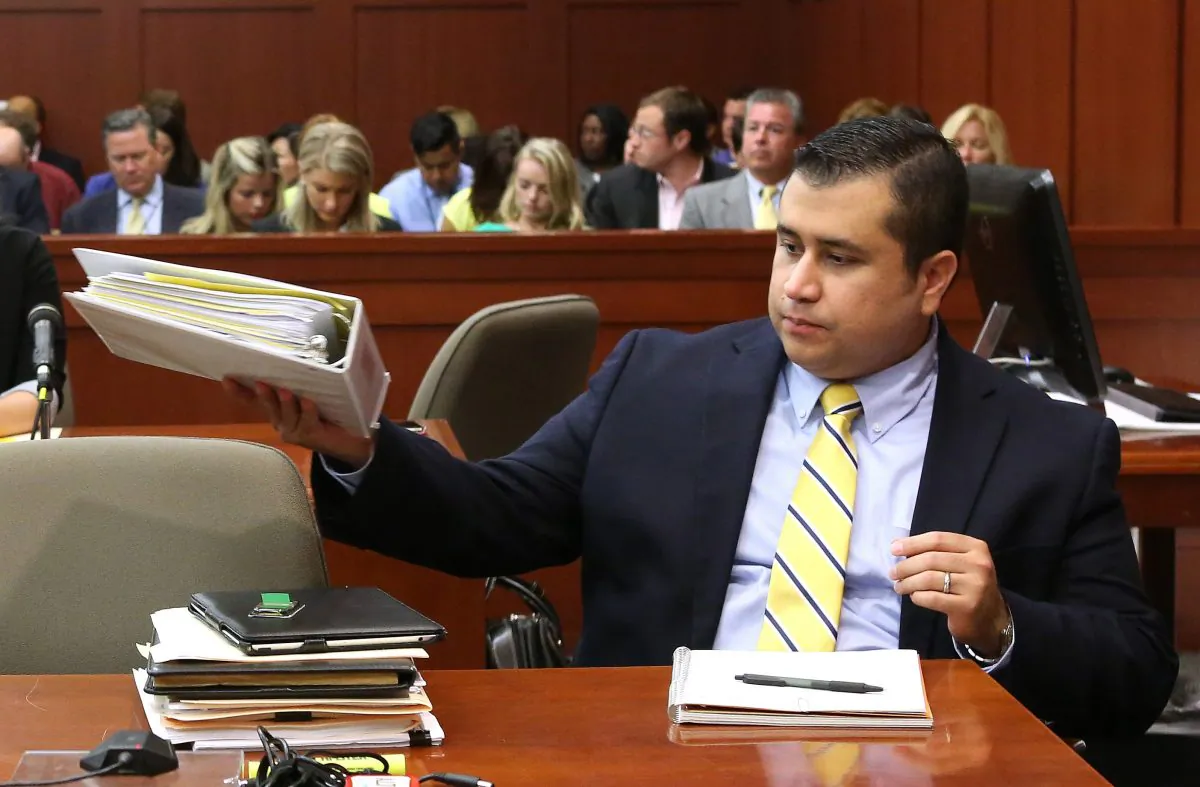George Zimmerman sits at the defense table at his trial in Seminole Circuit Court, in Sanford, Fla., Monday, July 8, 2013. Zimmerman is charged with second-degree murder in the fatal shooting of Trayvon Martin, an unarmed teen, in 2012. (AP Photo/Orlando Sentinel, Joe Burbank, Pool)
