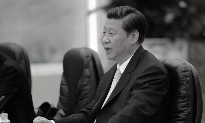 Chinese Communist Party leader Xi Jinping speaks during a meeting with Ethiopian Prime Minister Hailemariam Desalegn in the Great Hall of the People in Beijing on June 14, 2013. Xi appears to have engineered the weakening of power of former regime leader Jiang Zemin over the period since he took over as Party leader last November. (Goh Chai Hin/AFP/Getty Images) 