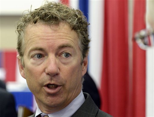 In this July 22, 2103 file photo, Sen. Rand Paul, R-Ky. speaks with reporters in Louisville, Ky.   (AP Photo/Timothy D. Easley, File)