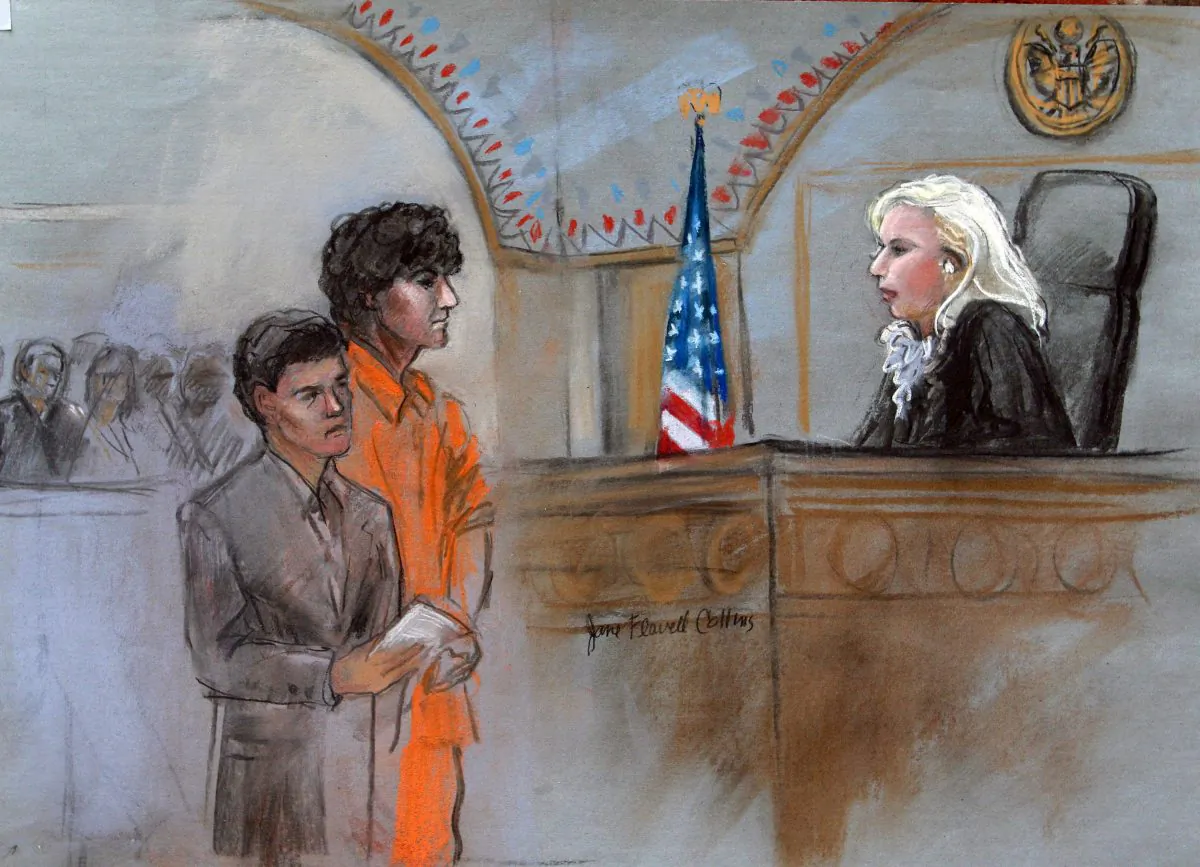 This courtroom sketch depicts Boston Marathon bombing suspect Dzhokhar Tsarnaev standing with his lawyer Miriam Conrad, left, before Magistrate Judge Marianne Bowler, right, during his arraignment in federal court Wednesday, July 10, 2013 in Boston. The 19-year-old has been charged with using a weapon of mass destruction, and could face the death penalty. (AP Photo/Jane Flavell Collins)