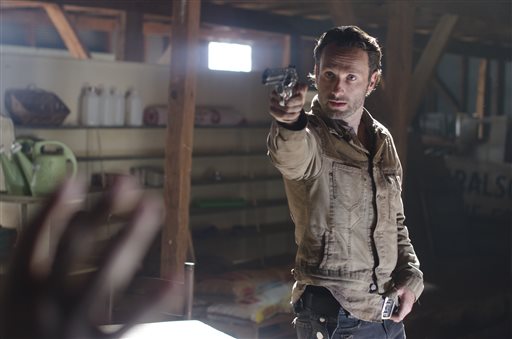 This image released by AMC shows Andrew Lincoln in a scene from "The Walking Dead." (AP Photo/AMC, Gene Page)