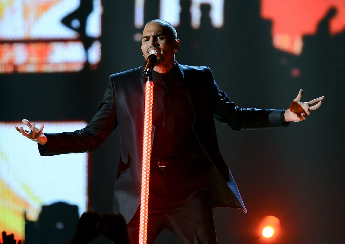R&B singer Chris Brown performs during the 2013 Billboard Music Awards on May 19, 2013, in Las Vegas. More than 12,000 people have signed a petition to stop Brown from performing in Halifax, Nova Scotia, next month. (Photo by Ethan Miller/Getty Images) 