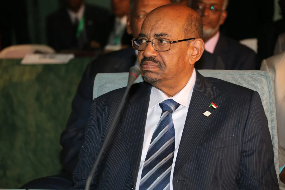 Sudanese President Omar al-Bashir, attends an African Union summit on health focusing on HIV and AIDS in Abuja, Nigeria, Monday, July 15, 2013, Angry that Nigeria is hosting a fugitive accused of genocide and war crimes, human rights lawyers Monday asked the Federal High Court to issue an arrest warrant for Sudan's leader Omar al-Bashir.Nigerian civil rights activists sent an urgent request to the International Criminal Court to refer the Nigerian government to the U.N. Security Council for failing to detain al-Bashir and surrender him to the court in The Hague for trial, said the Socio-Economic Rights and Accountability Project. (AP Photo/Sunday Aghaeze)