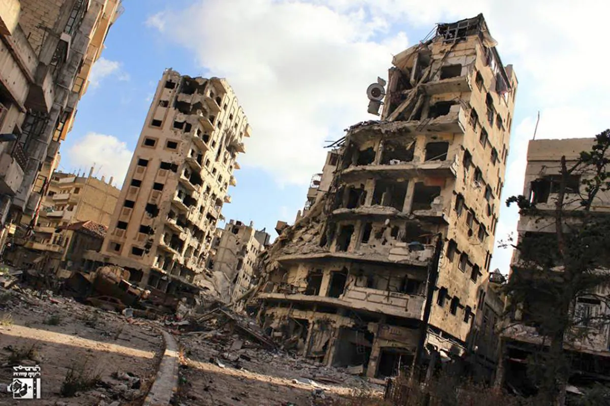 Buildings damaged by Syrian government airstrikes and shelling, in the Jouret al-Chiyah neighborhood of Homs, Syria, on July 3, 2013. (Lens Young Homsi/AP Photo)