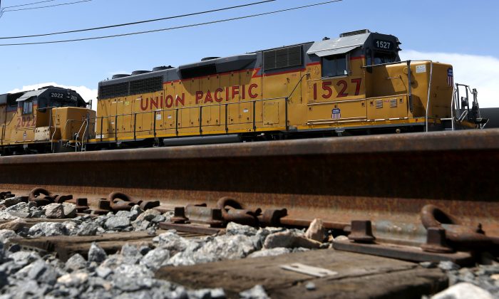 A Union Pacific locomotive sits on a track in a railyard in Phoenix, Arizona, on July 15, 2013. (Ross D. Franklin/AP Photo)