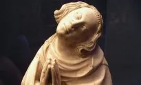 Sculpture of Saint Elzéar: Taking It on the Cheek