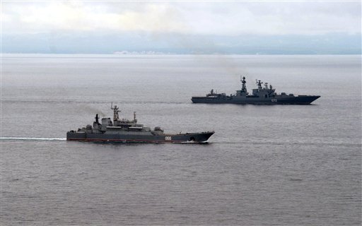 Russian Pacific Navy ships sail near the Sakhalin Island during military exercises on Tuesday, July 16, 2013. The maneuvers in Siberia and the far eastern region involved 160,000 troops and about 5,000 tanks - a massive show of force unprecedented since the Soviet times. (AP Photo/RIA Novosti, Alexei Nikolsky, Presidential Press Service, Pool)