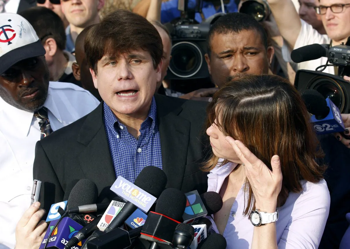 In this March 14, 2012 file photo, former Illinois Gov. Rod Blagojevich speaks to the media outside his home in Chicago. Lawyers for Blagojevich filed an appeal to reduce the ex-governor's sentence related to a corruption case. (AP Photo/M. Spencer Green)