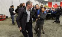 Harper’s Northern Tour Ends with Tussle Involving Chinese Reporter