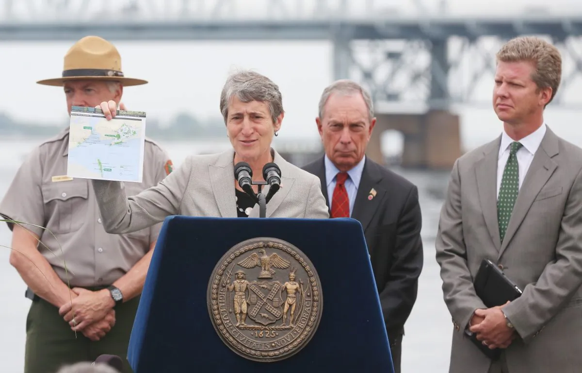 Secretary of the Interior Sally Jewell speaks at a press conference at Riis Landing on the Rockaway Peninsula, New York City, Aug. 12, 2013. To her right is Mayor Michael Bloomberg and Housing and Urban Development Secretary Shaun Donovan. (Gary Du/Epoch Times)