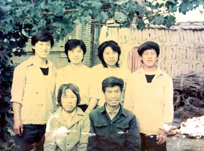 Pictured are the six members of the family of Chen Yunchuan, five of whom have died as a result of the persecution of Falun Gong in China. Chen Shulan, second from the right in the back, recently suffered two spinal fractures after being detained and is said to be unable to walk. (Minghui.org)
