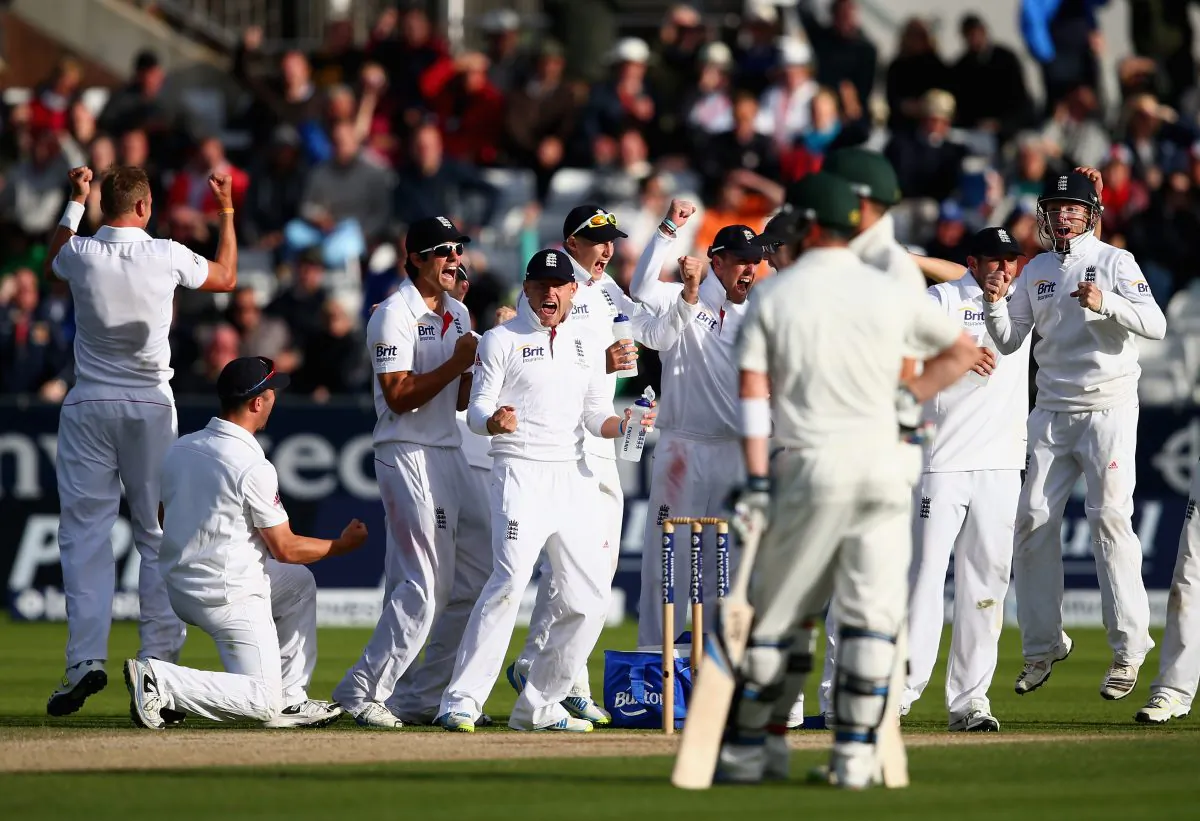 Stuart Broad (left) celebrates with his England team-mates after claiming the wicket of Brad Haddin at 7 for 181 runs during Day 4 of the fourth Ashes Test match against Australia at the Riverside Stadium in North-East England on Aug 12, 2013. With 118 runs needed to win, Australia were in deep trouble. England won by 74 runs. (Ryan Pierse/Getty Images)