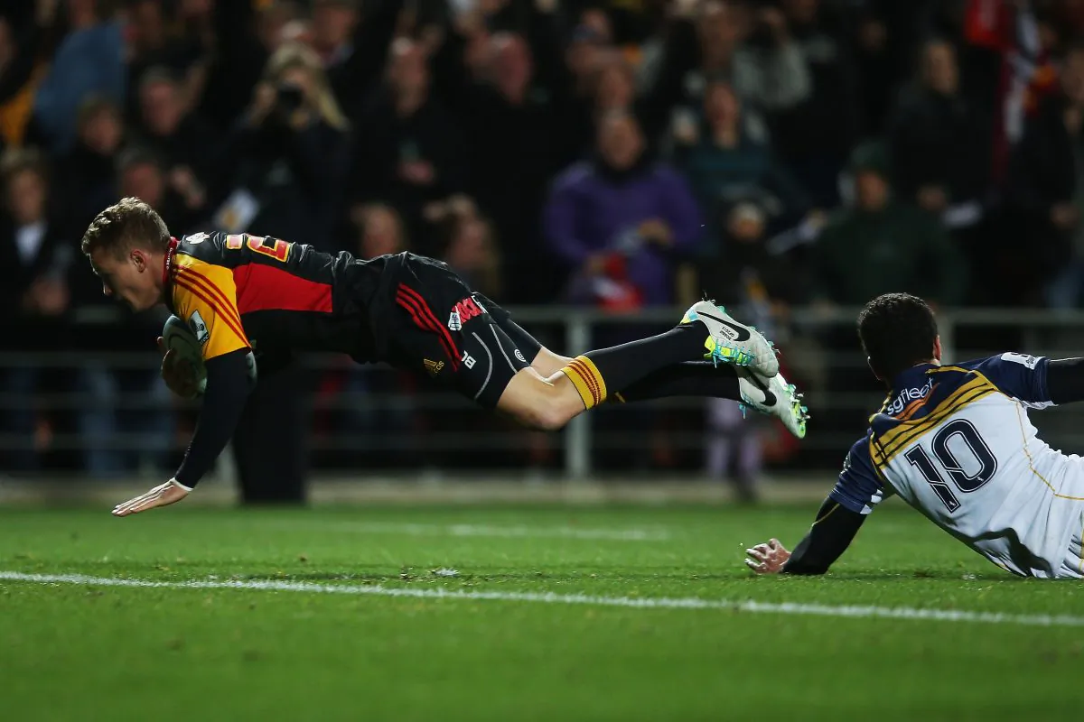 Robbie Robinson of the Chiefs dives over to score during the Super Rugby Final against the Brumbies at Waikato Stadium in Hamilton on August 3, 2013. (Hannah Johnston/Getty Images)