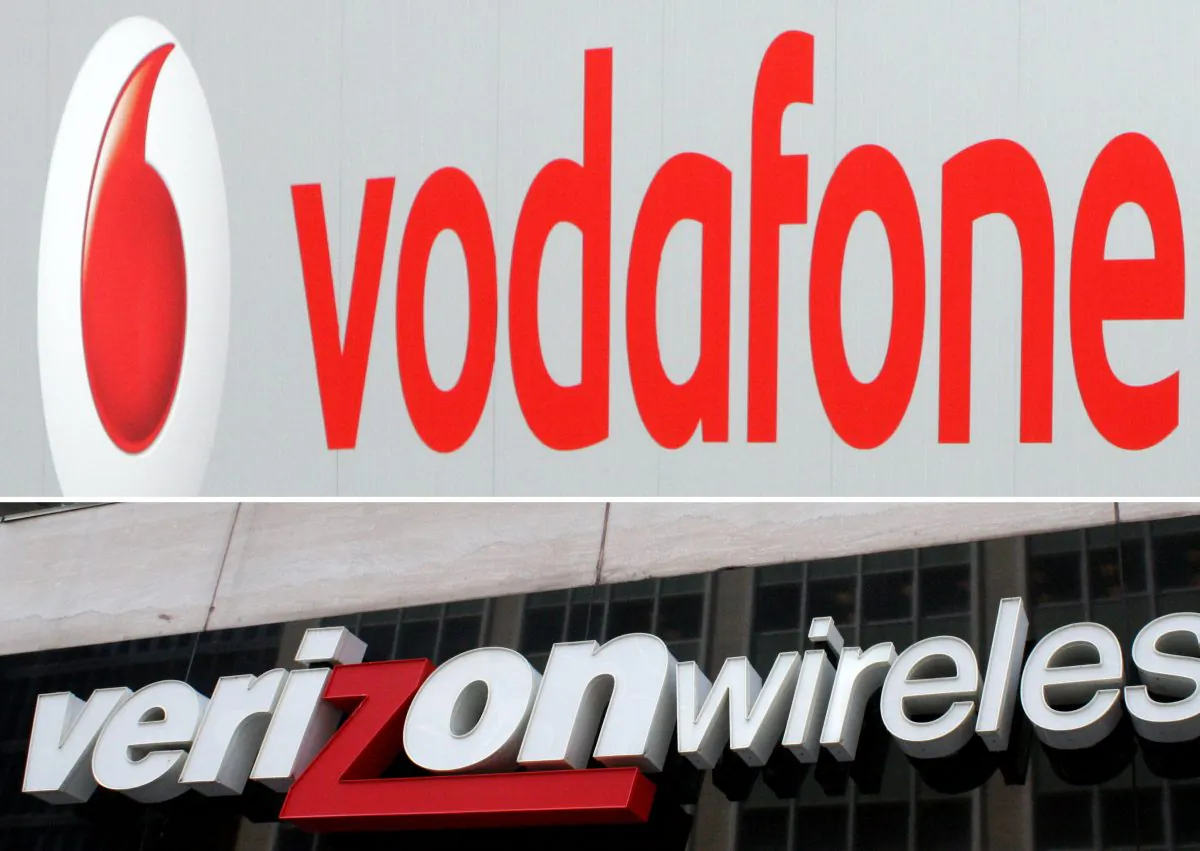 This Aug. 29 photo montage shows the logo for Verizon Wireless in Washington, D.C., in 2010 and the logo of British cellular provider Vodafone in Hanover, Germany, in 2007. (HAILEY SAYEGH,JOHN MACDOUGALL/AFP/Getty Images)