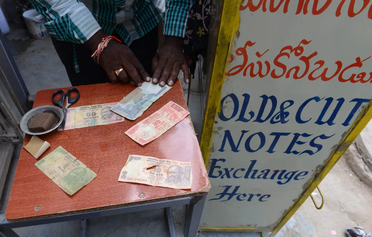 Indian rupee notes at a street stall in Hyderabad on August 29, 2013. India's and other emerging markets currencies and stock markets have suffered major losses in 2013.
