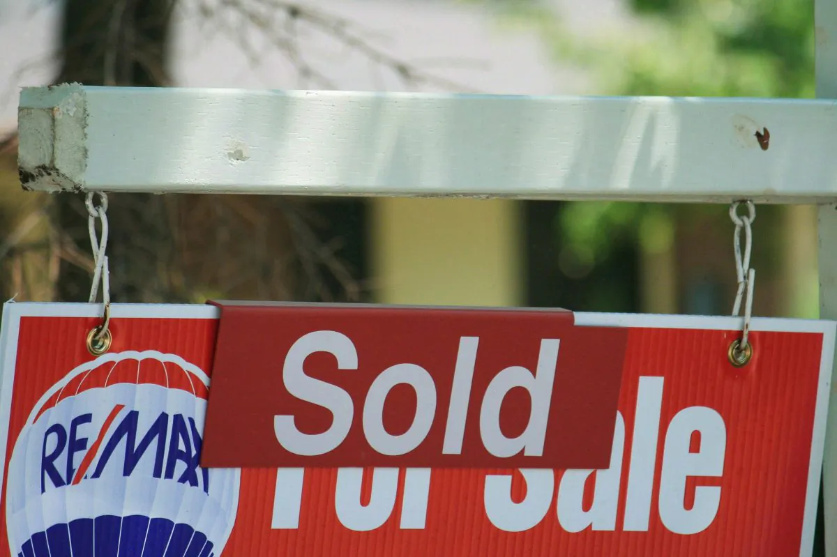 Amid concerns that Canada’s housing market is overheating, Ottawa is taking new steps to curtail taxpayer risk by limiting the guarantees on mortgage-backed securities it offers to banks and other lenders. The measure will require lenders to seek more costly funding sources for mortgages and is expected to drive up mortgage rates. (The Canadian Press/Richard Buchan)