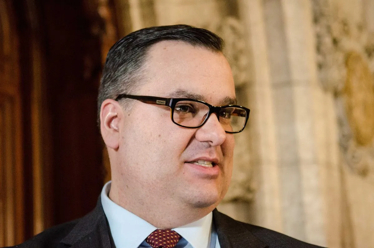 Industry Minister James Moore says the government's wireless strategy is squarely aimed at increasing competition and helping consumers get lower prices and better service. (Matthew Little/The Epoch Times)