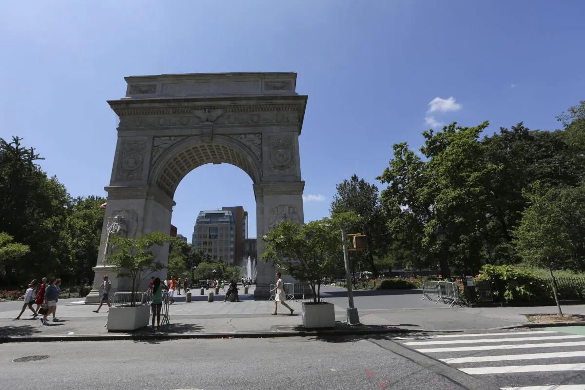 This Friday, July 5, 2013 photo shows the arch in Washington Square Park in New York. (AP Photo/Mary Altaffer)