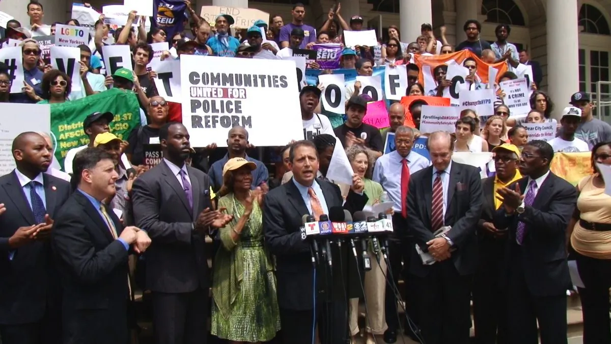Brad Lander (C) City Council members and advocacy groups gathered on City Hall steps in Lower Manhattan on July 24. They publicly vowed to override Mayor Michael Bloomberg's veto of a set of bills related to the city's controversial stop-and-frisk policy. (NTD Television)