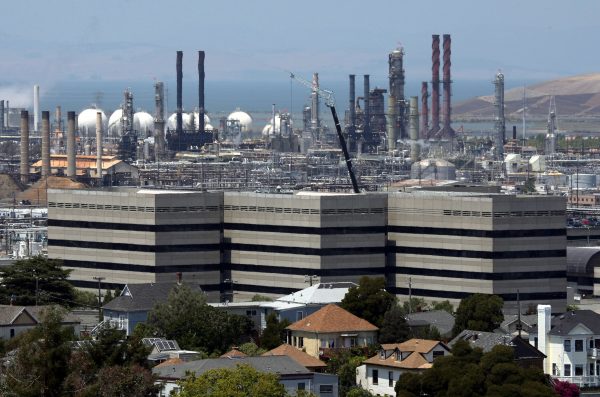 The Chevron Richmond oil refinery in San Francisco, where a fire broke out last year while workers attempted to fix an old leaking pipe. While only one worker was injured, investigators said it could have been a disaster. Around 15.000 people visited medical facilities because of breathing problems, and eye and throat irritations. (Justin Sullivan/Getty Images)